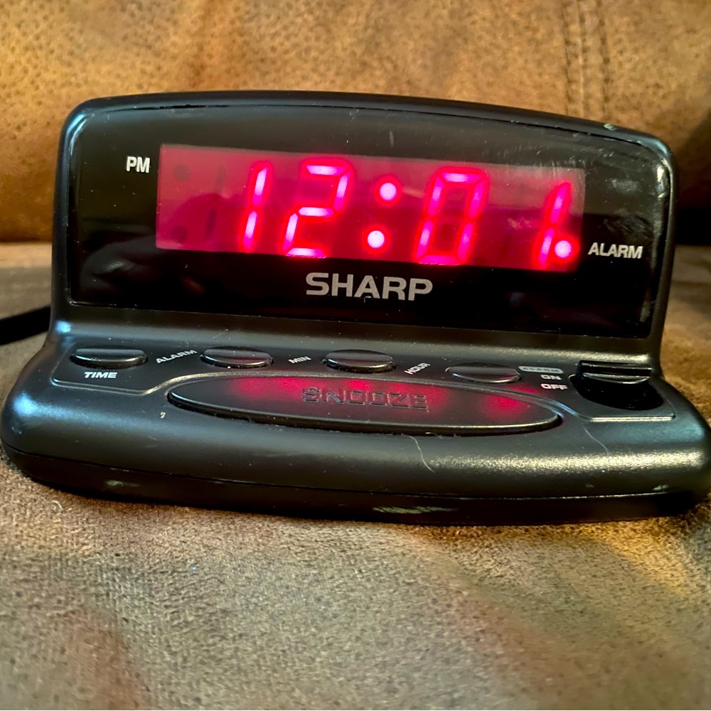 Vintage 4.5 Sharp Alarm Clock with Backup Battery. Ht- 2 inches.